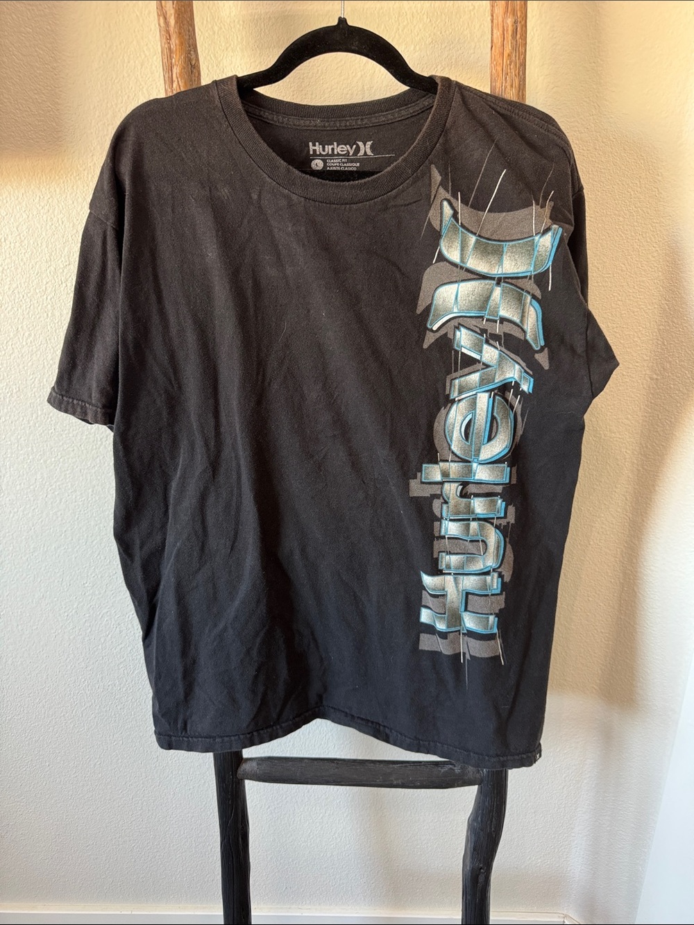 Hurley Black Tee with Aqua Blue Vertical Graphic